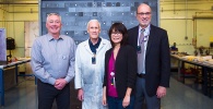 Dennis Whyte, Kord Smith, Lin-wen Hu, and David Moncton in front of the graphite pile