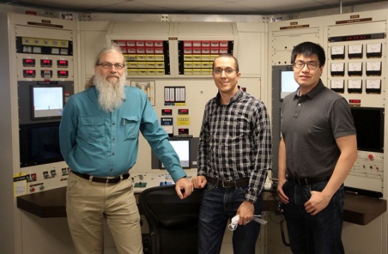NRL researchers Mike Ames, David Carpenter, and Kaichao Sun in the TREAT facility control room
